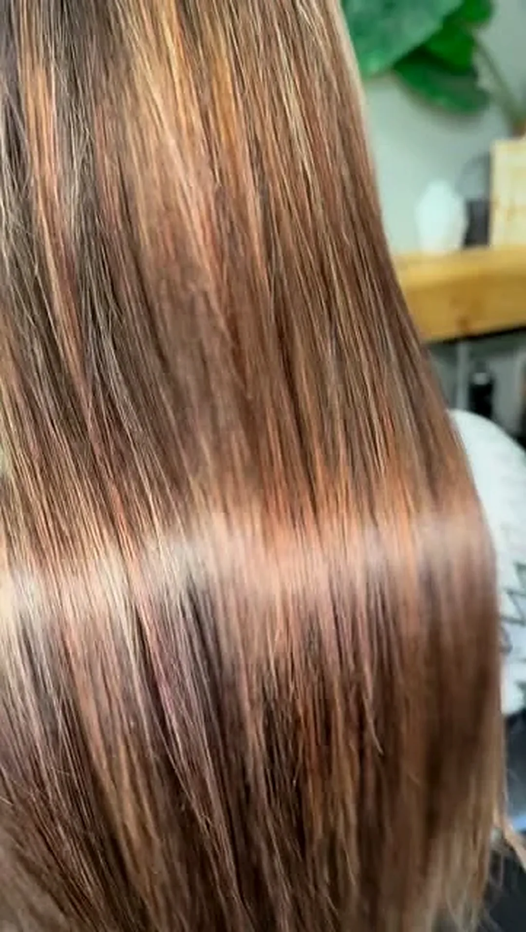 Smooth, glossy hair after a nanoplasty treatment