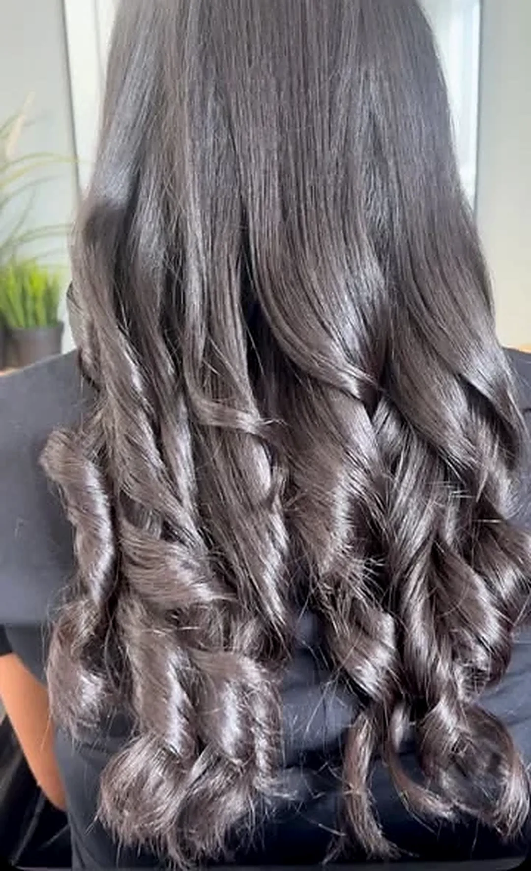 Glossy barrel curls after a blow dry